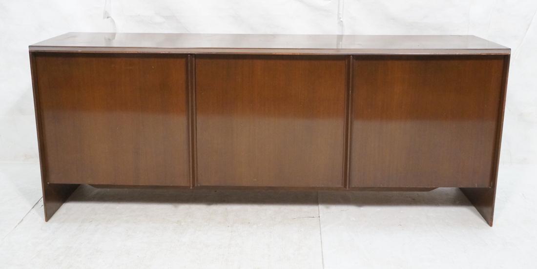 3 Door Dark Wood Modern Credenza. Front with a be: 3 Door Dark Wood Modern Credenza. Front with a beveled wood trim detail.-- Dimensions: H: 28 inches: W: 71.5 inches: D: 19.25 inches ---