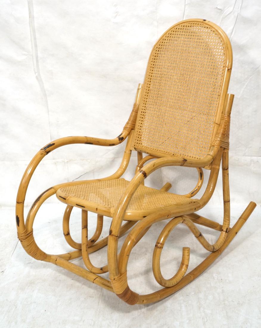 Bamboo & Rattan Wrapped Modern Rocking Chair. Roc: Bamboo & Rattan Wrapped Modern Rocking Chair. Rocker with caned seat and back. Albini Style-- Dimensions: H: 40 inches: W: 21.5 inches: D: 32 inches ---