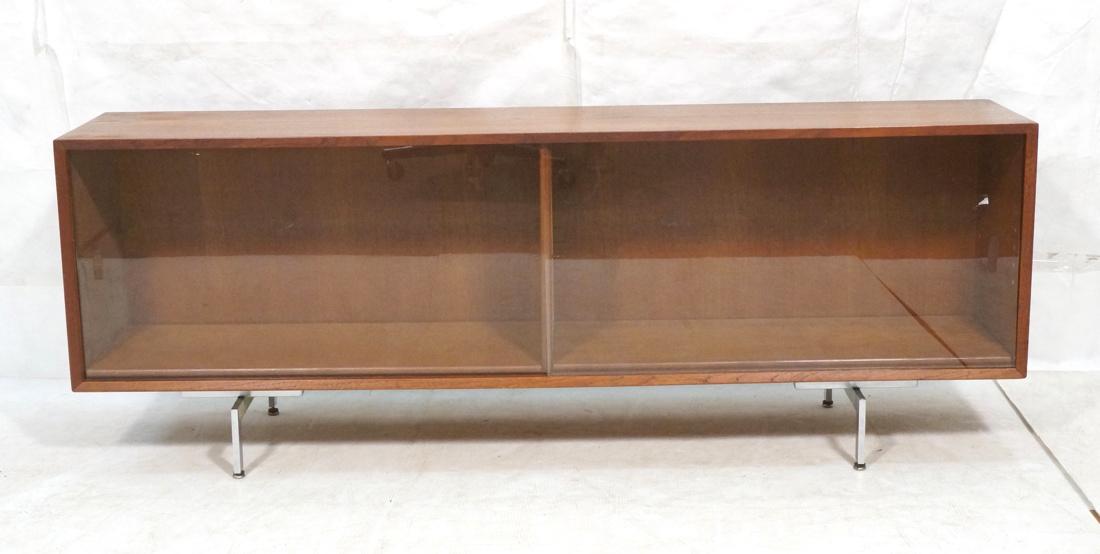 Low Horizontal form Teak Modern Credenza. Sliding (1 of 9)