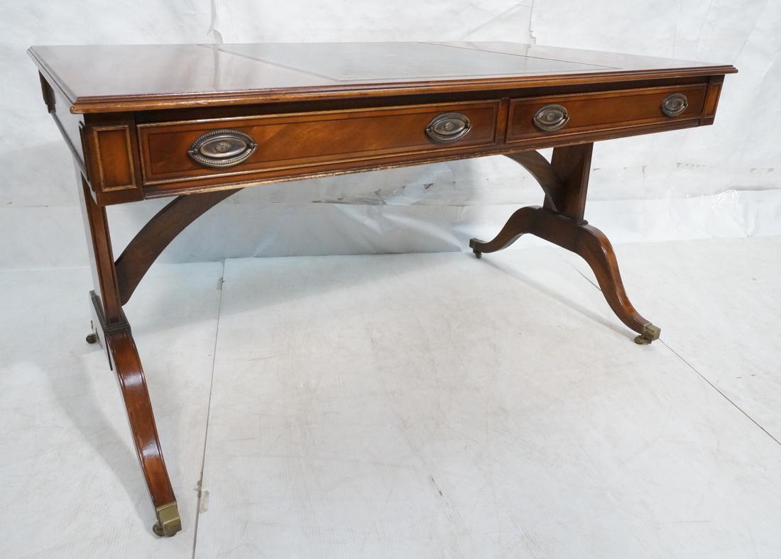 Black Leather Top Mahogany Desk. 2 drawer desk. D: Black Leather Top Mahogany Desk. 2 drawer desk. Duncan Phyfe legs with brass caps.-- Dimensions: H: 29.75 inches: W: 55 inches: D: 32 inches ---