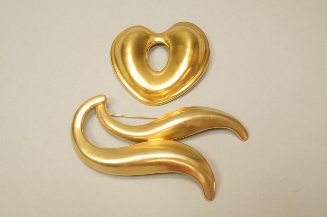 2 ROBERT LEE MORRIS Vintage Modernist Brooches. 1: 2 ROBERT LEE MORRIS Vintage Modernist Brooches. 1) Organic heart shape with oval opening. Marked. 2) large double S curve. Not marked.-- Dimensions: H: 3 inches: W: 4.75 inches --- US Shipping charge: