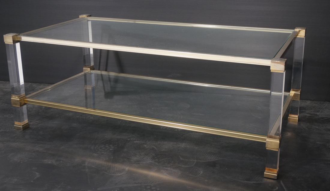 PIERRE VANDEL Modern Lucite Glass Cocktail Table.: PIERRE VANDEL Modern Lucite Glass Cocktail Table. Square lucite column legs with mixed metal frame & accents. Marked Pierre Vandel Paris.-- Dimensions: H: 16 inches: W: 42.75 inches: D: 21.75 inches -