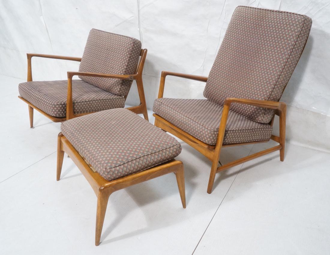 3pc Modernist Paddle Arm Lounge Chairs & Ottoman.: 3pc Modernist Paddle Arm Lounge Chairs & Ottoman. Selig. His and Her Chairs. Mrs. Chair has shaped spindle back & open arm frame. Mr. Chair has spring support for back cushion. Wood frame ottoman with