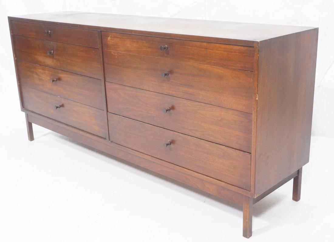 American Modern Walnut Credenza Dresser. Raised s: American Modern Walnut Credenza Dresser. Raised square wood legs. Walnut skirt. Modernist corseted wood pulls. -- Dimensions: H: 31.75 inches: W: 71 inches: D: 18 inches ---