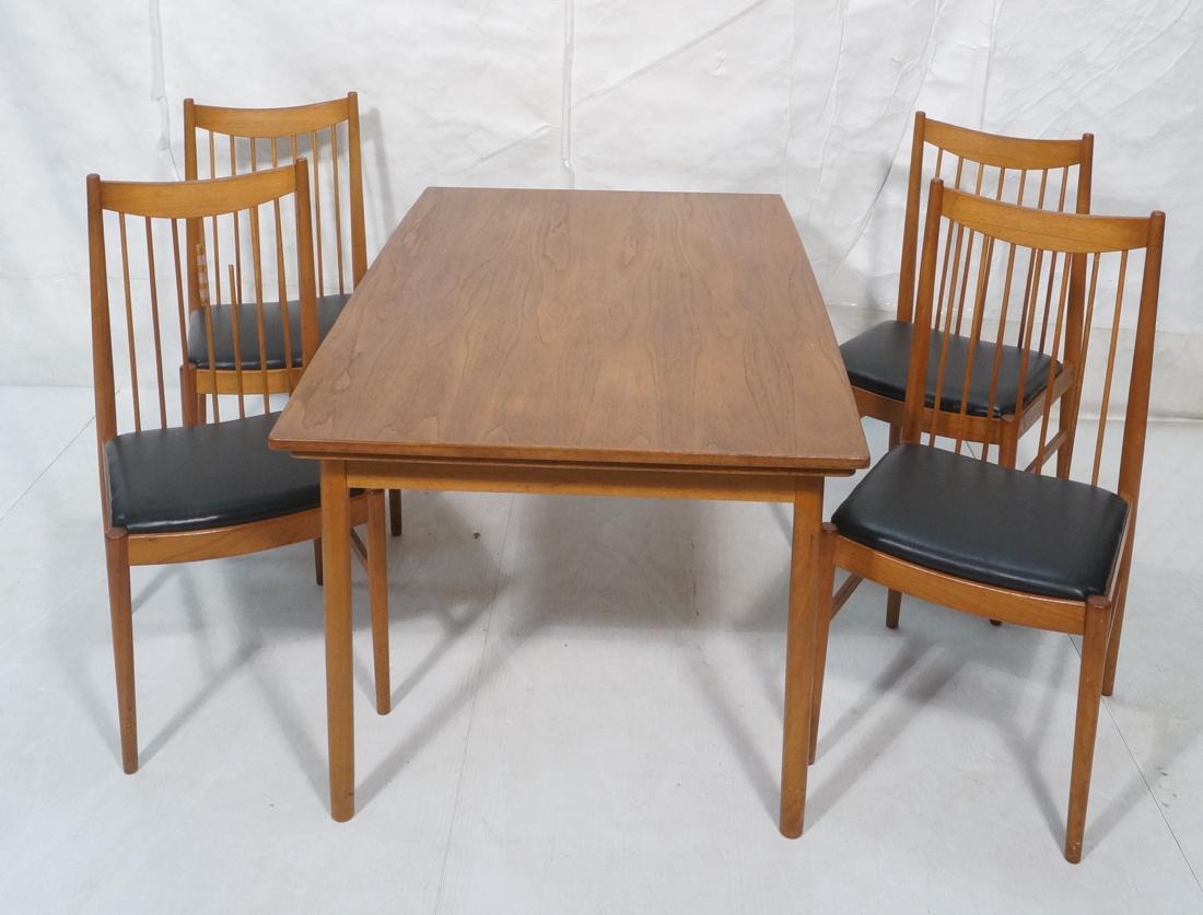 5pc SIBAST Danish Modern Teak Dining Table Chairs: 5pc SIBAST Danish Modern Teak Dining Table Chairs. Arne Vodder. Refractory dining table with swollen tapered legs. Two 21.5" pull out leaves. 4 dowel back dining chairs with bowed back rests. Sibast f