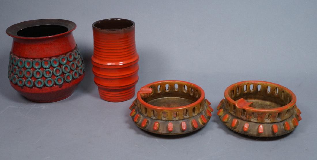 4pc Italian Pottery Lot. Orange glaze. Raymor. 2: 4pc Italian Pottery Lot. Orange glaze. Raymor. 2 sculptural form ashtrays and 2 orange vases; one with turquoise accents. One ashtray marked Raymor-- Dimensions: H: 6.75 inches: W: 7 inches: D: 7 inch