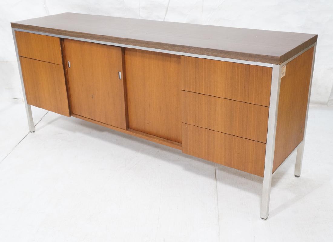 American Modern JG STANDARD Credenza. Wood grain: American Modern JG STANDARD Credenza. Wood grain laminate top. Exposed stainless frame legs and trim. -- Dimensions: H: 29 inches: W: 66 inches: D: 17.75 inches ---