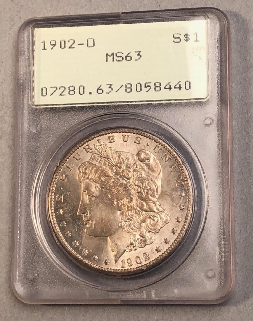 1902-O Morgan Silver American Dollar. In Old grad (1 of 2)