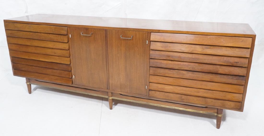 AMERICAN of MARTINSVILLE Walnut Credenza Sideboar: AMERICAN of MARTINSVILLE Walnut Credenza Sideboard. 6 sculptural louver drawers, 2 doors. Modernist metal trim and hinges. Marked.-- Dimensions: H: 30.5 inches: W: 84 inches: D: 19.5 inches ---