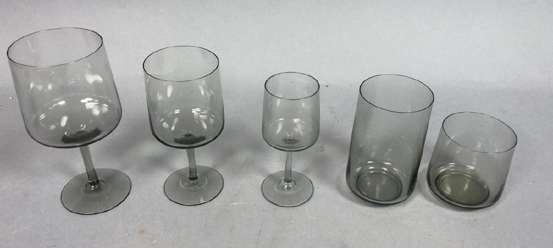 39pc SVED JENSEN Denmark HOLMEGAARD Stemware. 8 T: 39pc SVED JENSEN Denmark HOLMEGAARD Stemware. 8 Tumblers 4.75". 8 Small Water Glasses. 8 Tall Wine Glasses 6.5". 7 Small stems 6". 8 Small stems 5". Smoky Gray Glass. -- Dimensions: ---