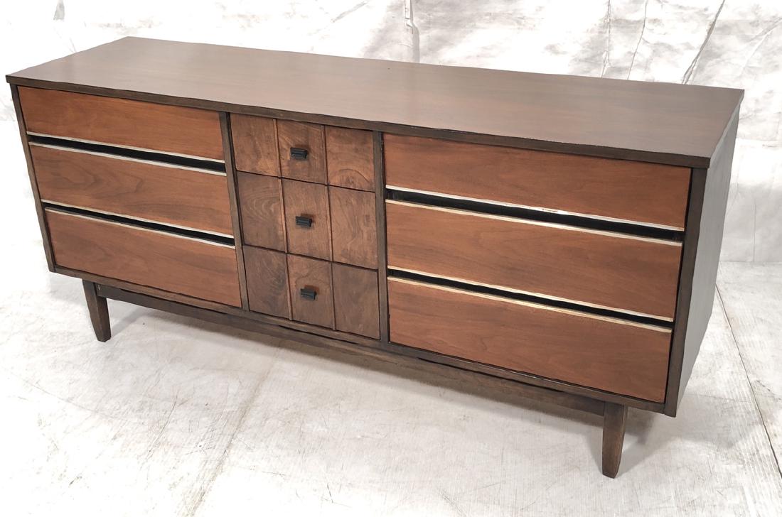 Modernist Contrasting Tone Wood Credenza Sideboar: Modernist Contrasting Tone Wood Credenza Sideboard. Horizontal aluminum drawer trim, raised on legs. -- Dimensions: H: 30 inches: W: 66 inches: D: 18.75 inches ---