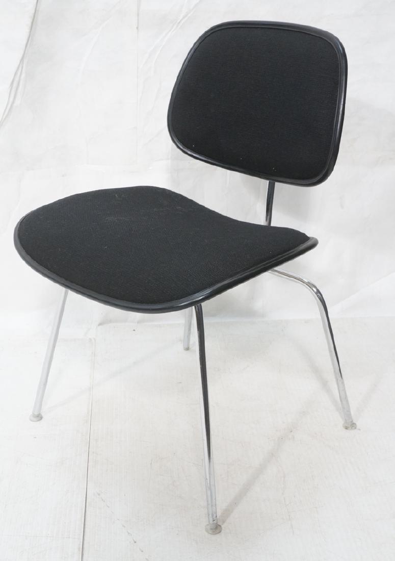 CHARLES EAMES for HERMAN MILLER Chair. Black fabr: CHARLES EAMES for HERMAN MILLER Chair. Black fabric seat and back with rubber trim. Chrome metal legs. Herman Miller paper label. -- Dimensions: H: 30.5 inches: W: 20 inches: D: 20 inches ---