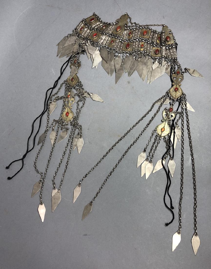 Lg Silver Tone & Brass Turkoman Headdress. Almond: Lg Silver Tone & Brass Turkoman Headdress. Almond carnelian stones. Has 2 long dangle ornaments. -- Dimensions: H: 19.5 inches: W: 16 inches--- Weight: 19.65 Troy ozs. ---- --- US Shipping charge: $10