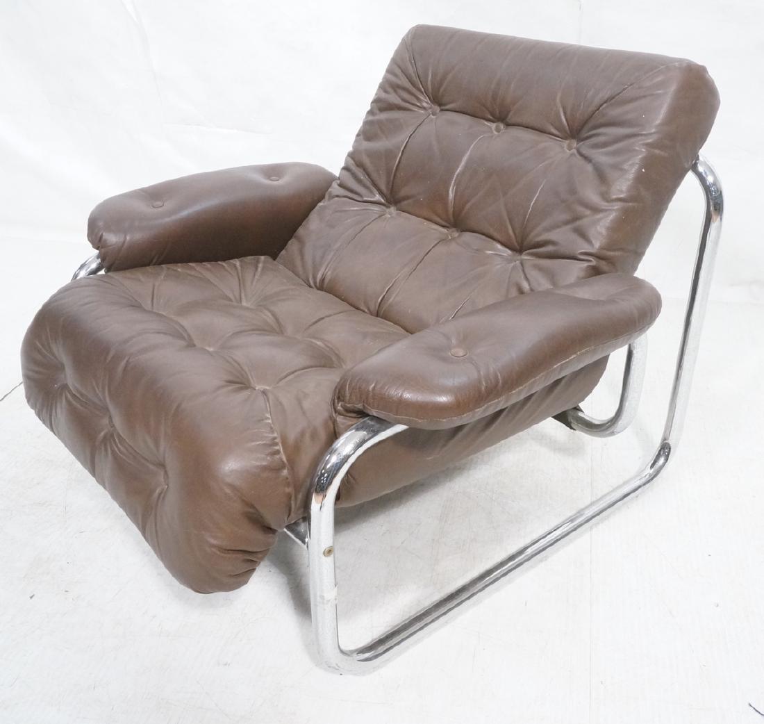 Brown Leather Chrome Frame Modernist Lounge Frame: Brown Leather Chrome Frame Modernist Lounge Frame. Thick chrome tube frame with tufted leather sling seat and arms. -- Dimensions: H: 28.5 inches: W: 36 inches: D: 37.25 inches ---