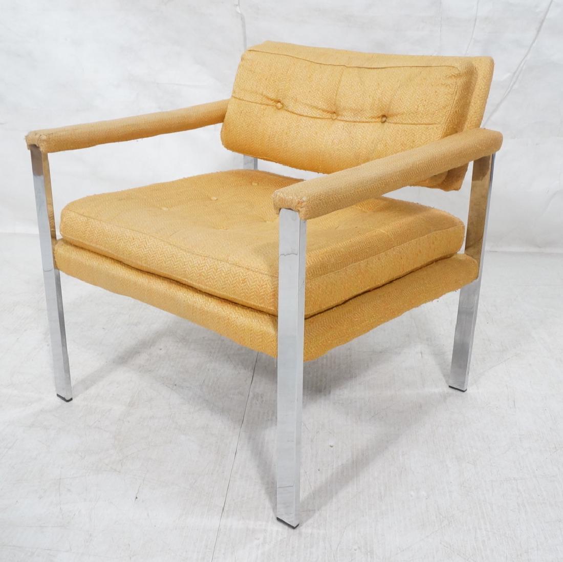 MILO BAUGHMAN Style Chrome Lounge Chair. Orange y: MILO BAUGHMAN Style Chrome Lounge Chair. Orange yellow upholstered seat, back and arms. -- Dimensions: H: 28 inches: W: 28 inches: D: 27 inches ---
