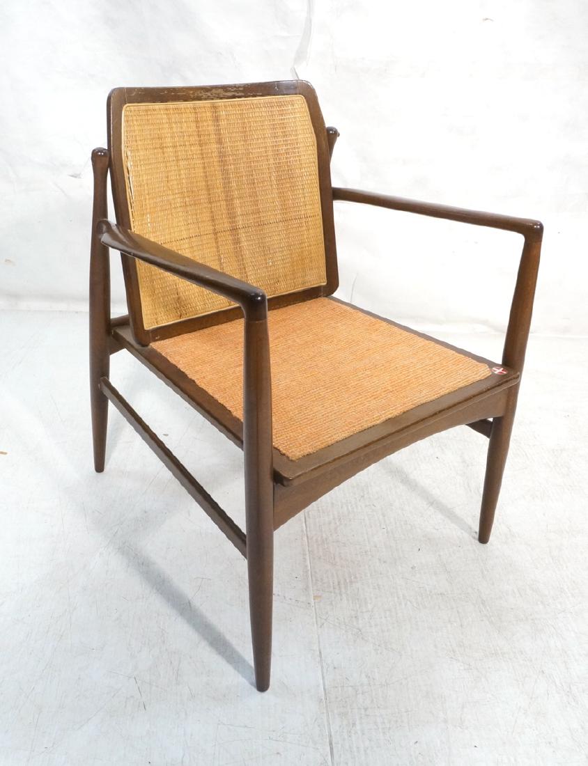Selig Danish Modern Dark Wood Open Arm Chair. Wov: Selig Danish Modern Dark Wood Open Arm Chair. Woven rattan back. Danish control tag. -- Dimensions: H: 30.5 inches: W: 23.5 inches: D: 24.5 inches ---