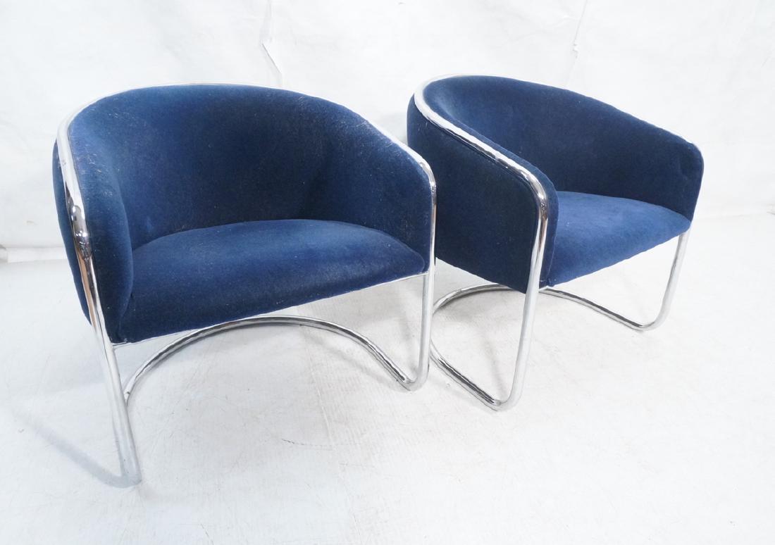 Pr THONET Chrome Frame Modernist Lounge Chairs. R: Pr THONET Chrome Frame Modernist Lounge Chairs. Rich blue mohair fabric on barrel back form. Chrome tube rounded frame. Paper label.-- Dimensions: H: 27 inches: W: 28 inches: D: 26.5 inches ---
