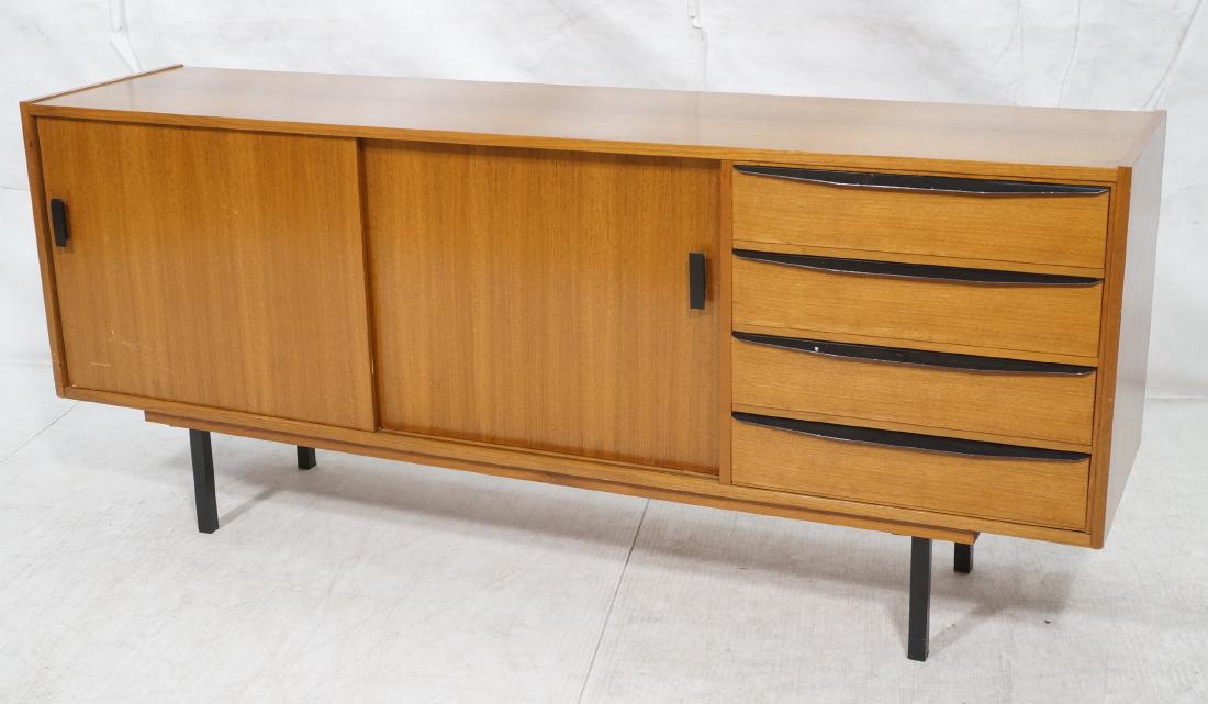 Danish Modern Teak Credenza Sideboard. Black meta: Danish Modern Teak Credenza Sideboard. Black metal pulls and square tube legs. -- Dimensions: H: 28.75 inches: W: 67 inches: D: 17 inches ---