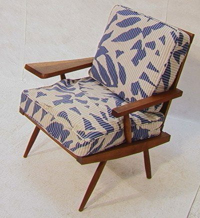 Nakashima Inspired Paddle Arm Lounge Chair. Solid: Nakashima Inspired Paddle Arm Lounge Chair. Solid wood construction. Dimensions: H: 31.5 inches: W: 31 inches: D: 24.25 inches Condition: Good condition. Replaced wood seat bottom. Minor wear to finis