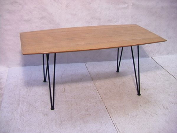 Arthur Umanoff for Raymor Dining Table with Iron B: Arthur Umanoff for Raymor Dining Table with Iron Base. Unmarked. Attribution. Beveled edge table. Dimensions: H: 28 inches: W: 36 inches: L: 66 inches Condition: Very Good Condition. Some blemishes on