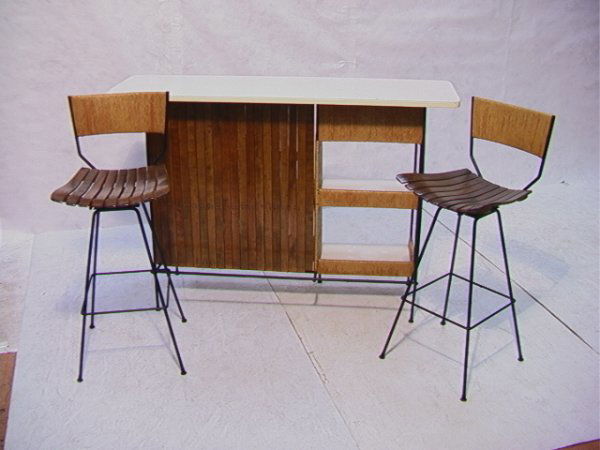 Arthur Umanoff for Raymor Bar and Barstools. Wood: Arthur Umanoff for Raymor Bar and Barstools. Wood slat and rush on iron frame. White Formica top. Dimensions: H: 40 inches: W: 20 inches: L: 58.5 inches Condition: stool 41x17.25x14. Very Good Conditi