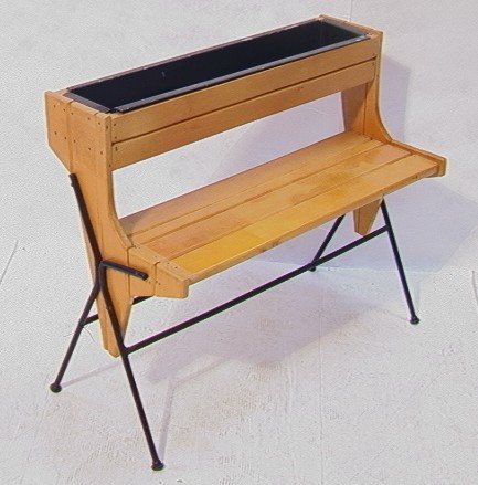 Arthur Umanoff for Raymor Planter Shelf. Wood sla: Arthur Umanoff for Raymor Planter Shelf. Wood slat on iron base. Dimensions: H: 27 inches: W: 31.5 inches: L: 16 inches Condition: Some nails bent. Minor loss to black finish. US Shipping charge: Pick