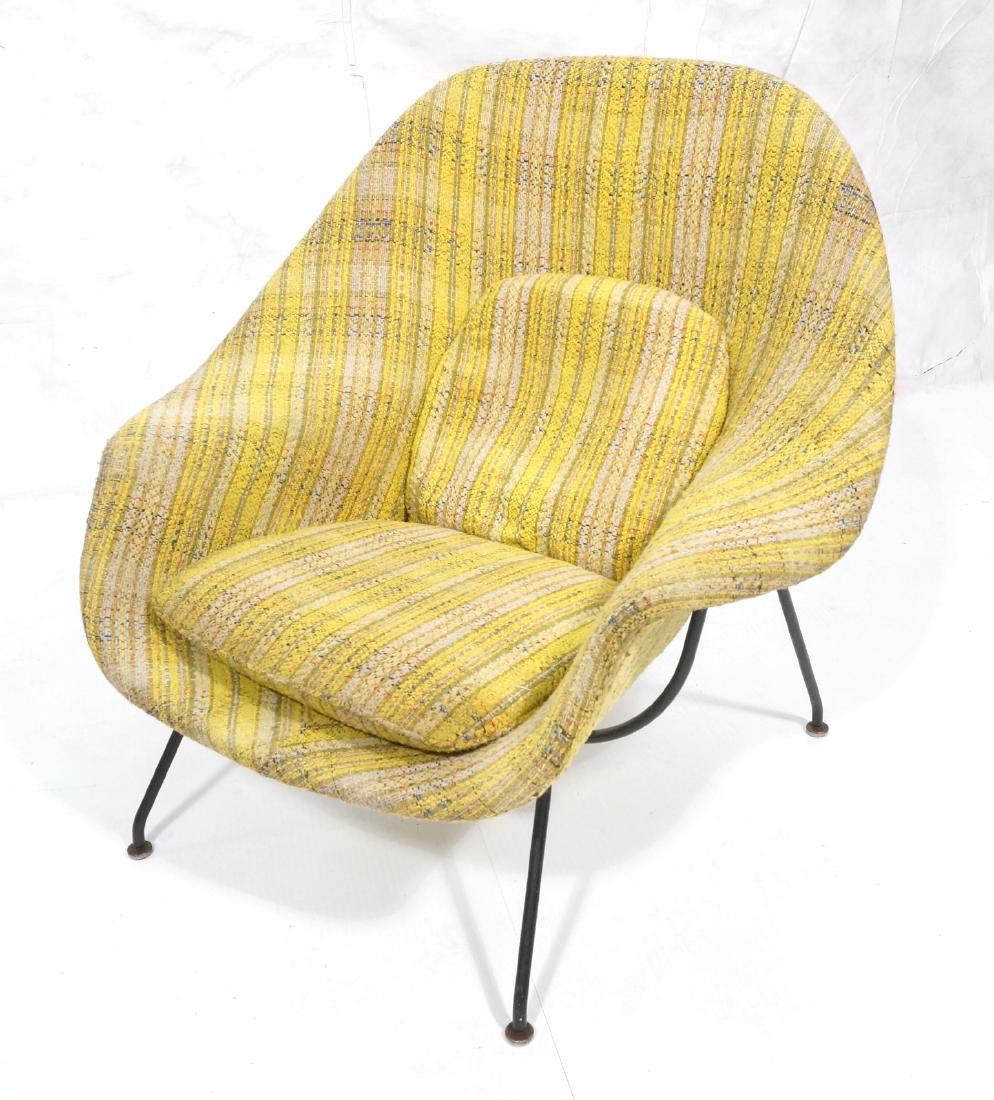 Eero Saarinen Knoll Womb Lounge Chair. Striped ye: Eero Saarinen Knoll Womb Lounge Chair. Striped yellow and beige fabric covered shell. Black metal frame.-- Dimensions: H: 35.5 inches: W: 38.5 inches: D: 35 inches ---