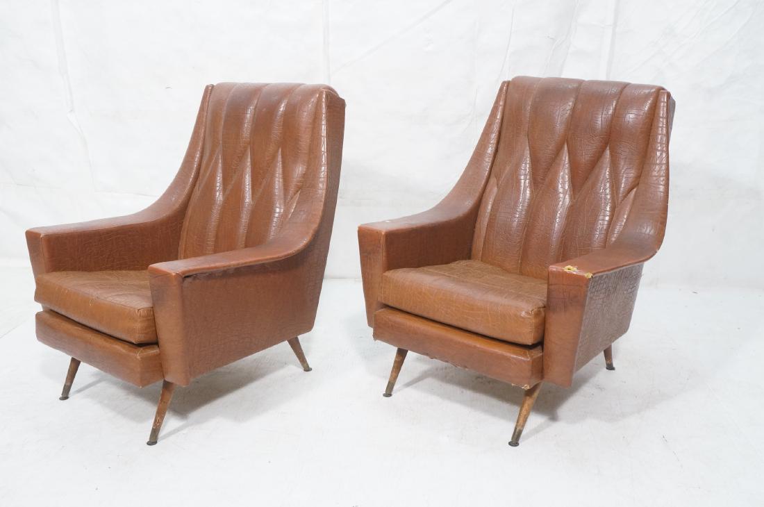 Pr Retro Italian Modern Lounge Chairs. Wide Slope: Pr Retro Italian Modern Lounge Chairs. Wide Sloped Arm Modern Lounge Chairs. Brick colored textured vinyl with diamond point tufting.-- Dimensions: H: 35.5 inches: W: 31 inches: D: 31.5 inches ---