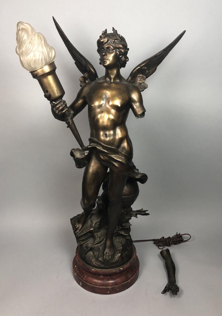 Cast Metal Figural Lamp. Nude male figure with ex: Cast Metal Figural Lamp. Nude male figure with extended wings holds flame torch light. Red marble base. After Moreau. -- Dimensions: H: 31.25 inches: W: 14 inches: D: 13 inches ---