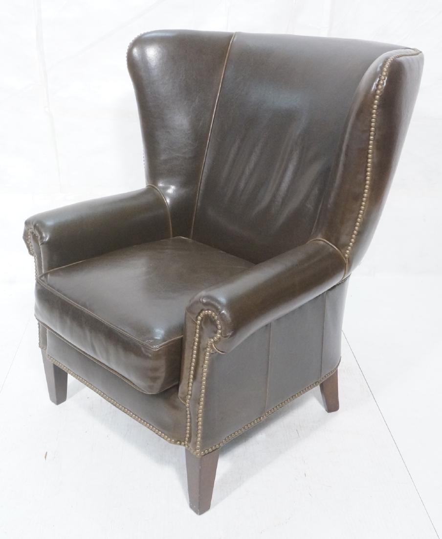 Paul Robert Brown Leather Contemporary Wing Chair: Paul Robert Brown Leather Contemporary Wing Chair. Full wide back, rolled arms and tapered square wood legs. Stud trim. Paul Robert label. -- Dimensions: H: 43 inches: W: 38 inches: D: 38 inches ---