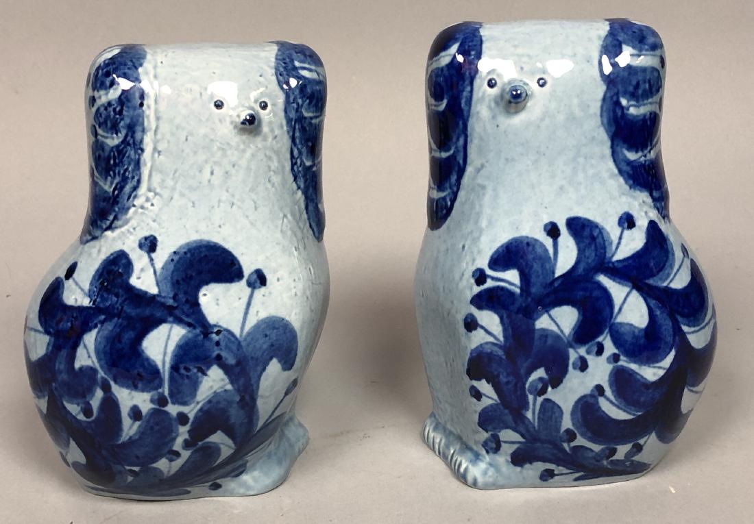 Pr LISA LARSON for GUSTAVSBERG Pottery Dogs. Humo: Pr LISA LARSON for GUSTAVSBERG Pottery Dogs. Humorous play on Staffordshire dogs. Light blue glaze with cobalt blue leaf and berry decorations. Swedish Art pottery. Signed Lisa L. Gustavsberg.-- Dimen