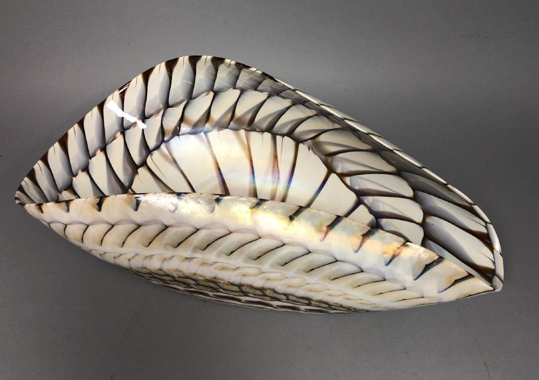 Contemporary Studio Art Glass Center Bowl. Large: Contemporary Studio Art Glass Center Bowl. Large bowl with rolled sides. White body with brown and gray feather designs, iridescent finish. Not marked.-- Dimensions: H: 8 inches: W: 21 inches: D: 11 i