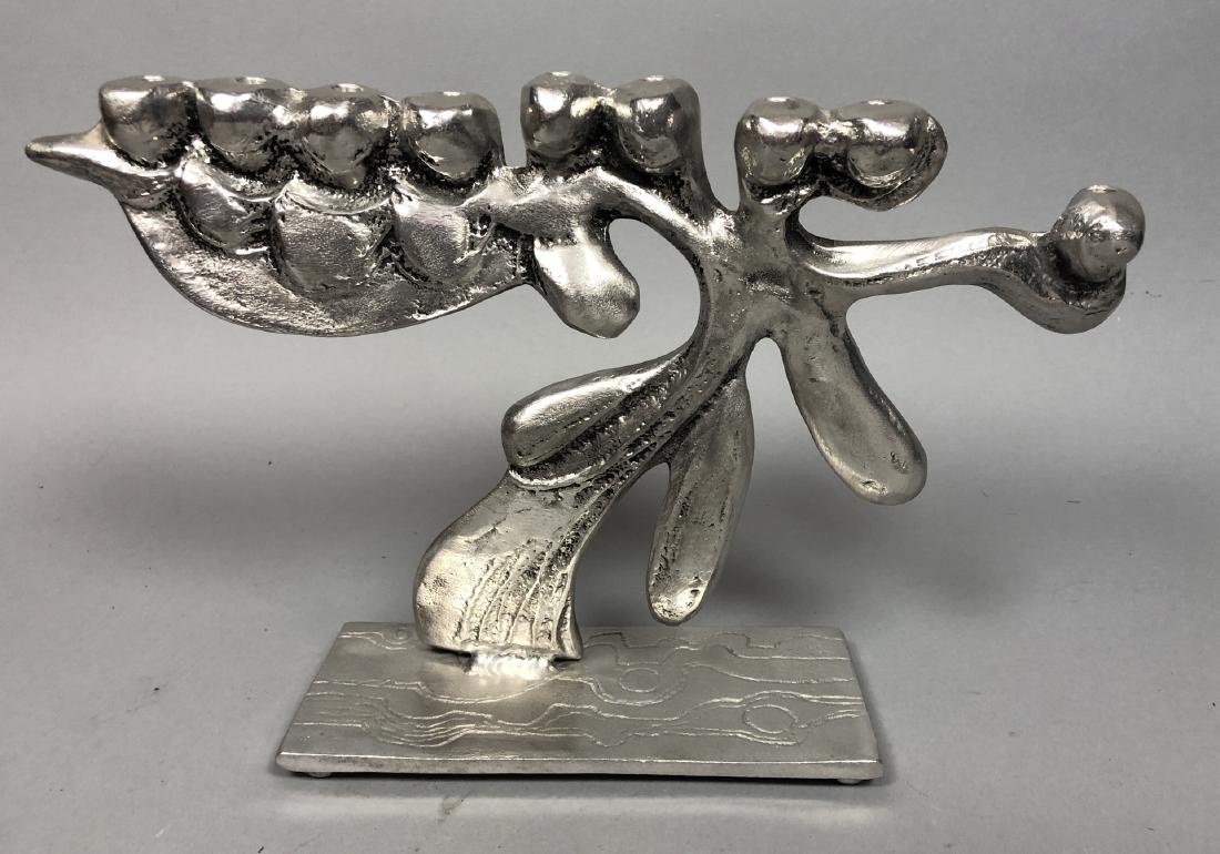 DONALD DRUMM Cast Metal Modernist Menorah Candles: DONALD DRUMM Cast Metal Modernist Menorah Candlestick. Organic abstract candle holder on sculptural metal base. Comes with Don Drumm studio card.-- Dimensions: H: 9.5 inches: W: 15 inches: D: 3.75 inc