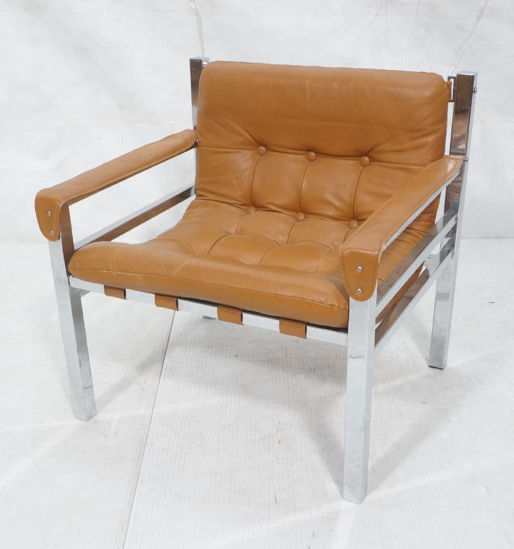 Light Brown Leather Chrome Tube Frame Lounge Chai: Light Brown Leather Chrome Tube Frame Lounge Chair. Tufted leather seat, leather strap arms. -- Dimensions: H: 28.5 inches: W: 29 inches: D: 24 inches ---