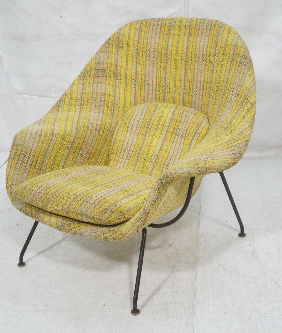 Upholstered Womb Chair. SAARINEN for KNOLL. Black: Upholstered Womb Chair. SAARINEN for KNOLL. Black tube frame, yellow and oatmeal textured upholstered shell. -- Dimensions: H: 37 inches: W: 38 inches: D: 41.5 inches ---