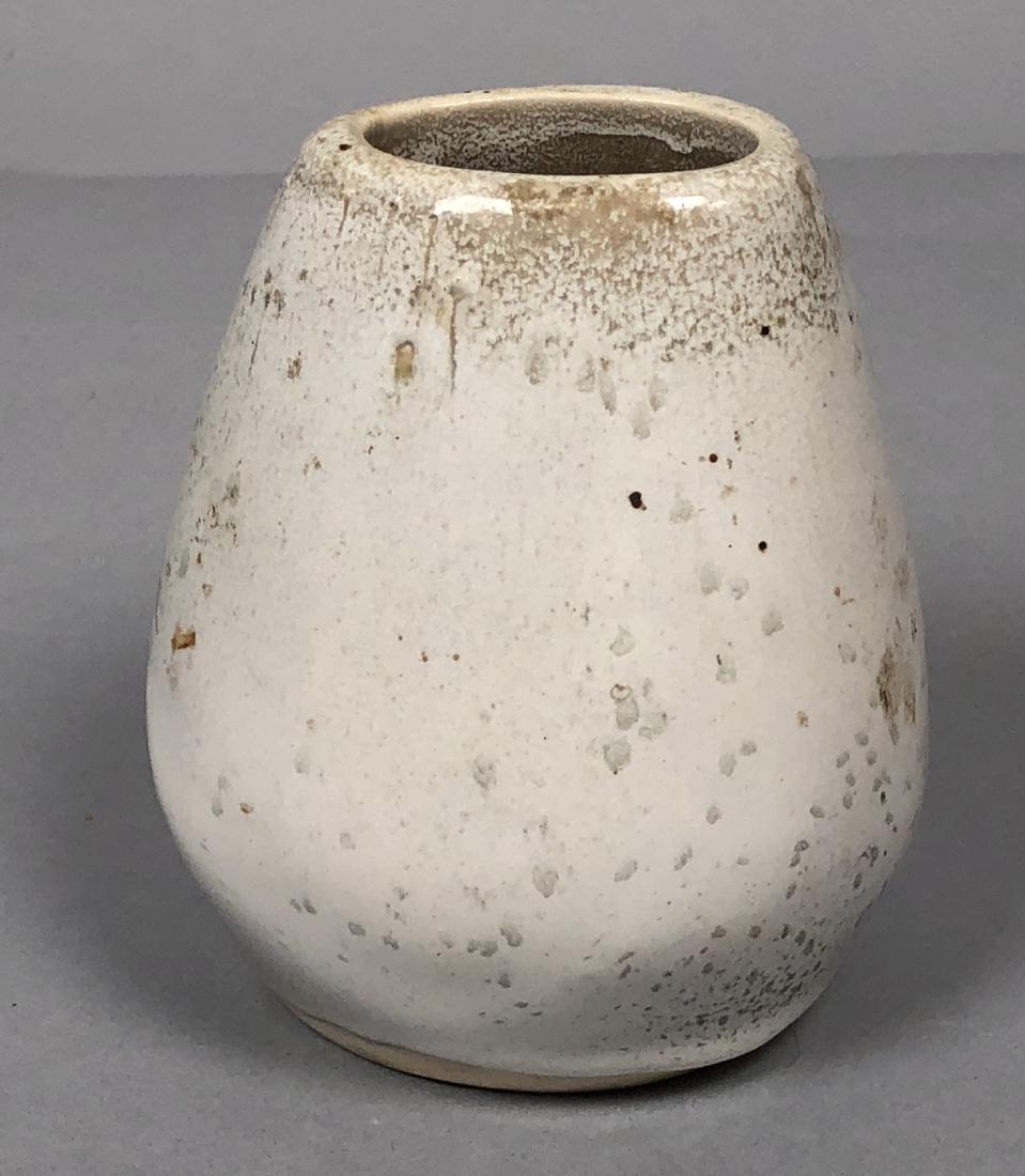 RUSSEL WRIGHT for BAUER Modernist Pottery Vessel.: RUSSEL WRIGHT for BAUER Modernist Pottery Vessel. Oatmeal glaze on heavy organic form. Marked.-- Dimensions: H: 4.75 inches: W: 4 inches: D: 3.5 inches --- US Shipping charge: $35