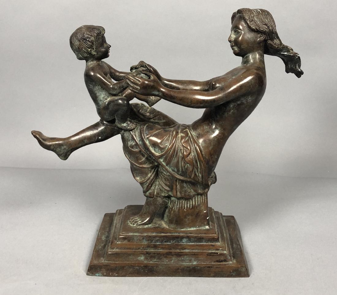 MAITLAND SMITH Cast Bronze Figural Sculptural. Nu: MAITLAND SMITH Cast Bronze Figural Sculptural. Nude female with child. Foil label.-- Dimensions: H: 13.5 inches: W: 15.5 inches: D: 5.75 inches ---