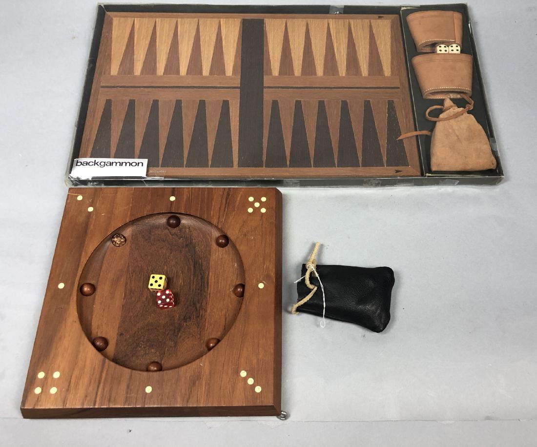 Mid Century Danish Teak Games. 1) SKJODE SKJAERN: Mid Century Danish Teak Games. 1) SKJODE SKJAERN Game Set with Dice. 2) HENNING DANG backgammon set, sealed.-- Dimensions: H: 11 inches: W: 20.5 inches --- US Shipping charge: $35