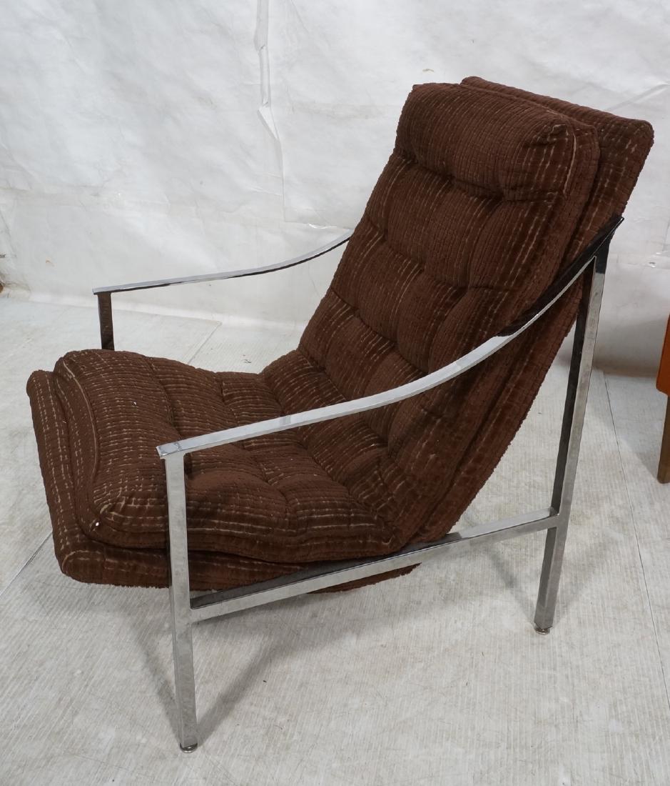 Modernist Chrome Frame Lounge Chair. Square tube: Modernist Chrome Frame Lounge Chair. Square tube frame with sloped arms. Textured brown upholstery tufted cushions. -- Dimensions: H: 36.5 inches: W: 24 inches: D: 37 inches ---