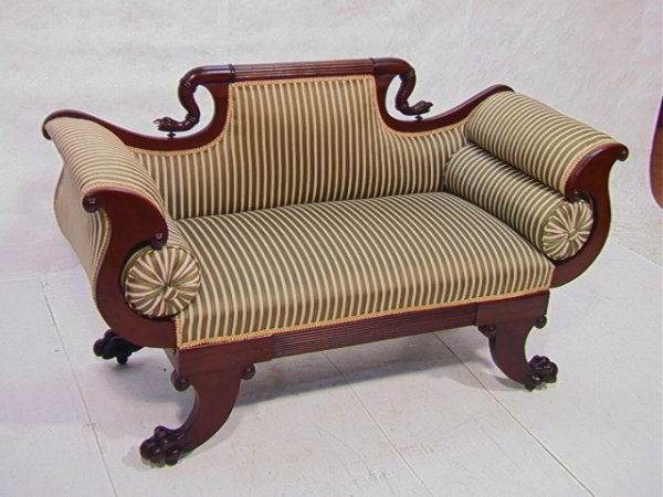 Antique Clawfoot Duncan Phyfe Style Settee formal: Antique Clawfoot Duncan Phyfe Style Settee formal striped upholstery with bolsters on both ends. Serpent head carving on back. Dimensions: H: 36 inches: W: 63 inches: D: 24 inches Condition: Excellent