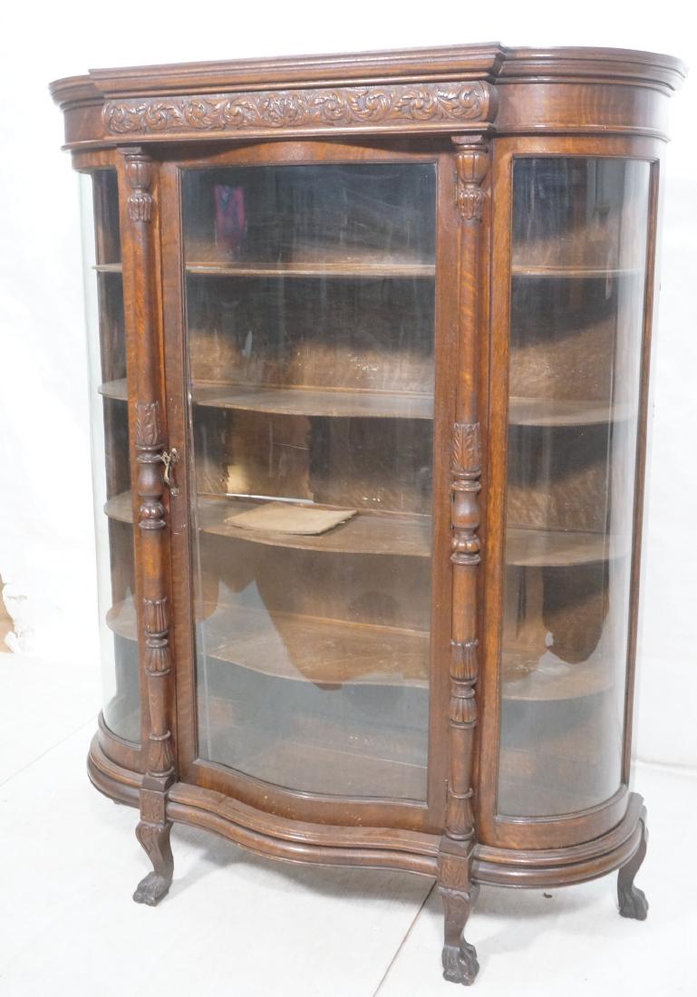 Richly Carved Antique Oak Bowfront China