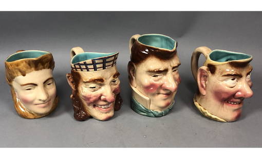 4 SARREGUEMINES French Majolica Face Pitchers. 1: 4 SARREGUEMINES French Majolica Face Pitchers. 1 blond female; marked 3358. 3 males with red cheeks & noses; marked G3258, 3297, 3210. All marked Sarreguemines.-- Dimensions: H: 7.75 inches: W: 6 inch