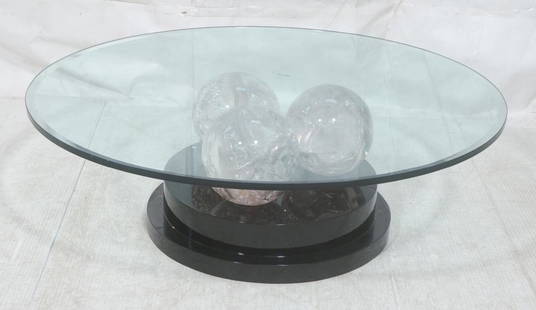 Modernist Round Glass Coffee Table. 3 large fract: Modernist Round Glass Coffee Table. 3 large fractured resin spheres on stepped black base. .5" thick glass. Pierre Giraudon Style.-- Dimensions: H: 16 inches: W: 48 inches: D: 48 inches ---