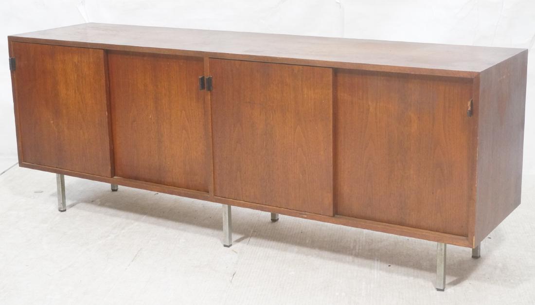 KNOLL American Modern Walnut Credenza Cabinet. Sl: KNOLL American Modern Walnut Credenza Cabinet. Sliding fronts with leather handles. Square tube chrome legs.-- Dimensions: H: 27.5 inches: W: 72 inches: D: 18 inches ---