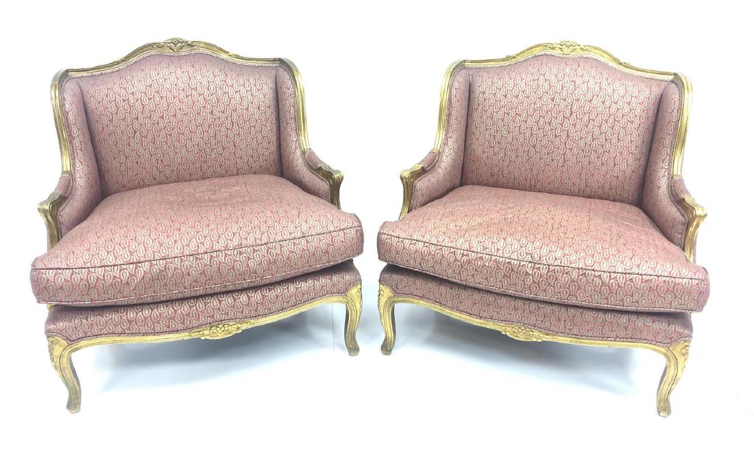 Pr Down Cushion French style Carved Gilt Wood Cha: Pr Down Cushion French style Carved Gilt Wood Chairs. Wide Bergere style arm chairs. Burgundy and gray paisley fabric.-- Dimensions: H: 37 inches: W: 36 inches: D: 32 inches ---