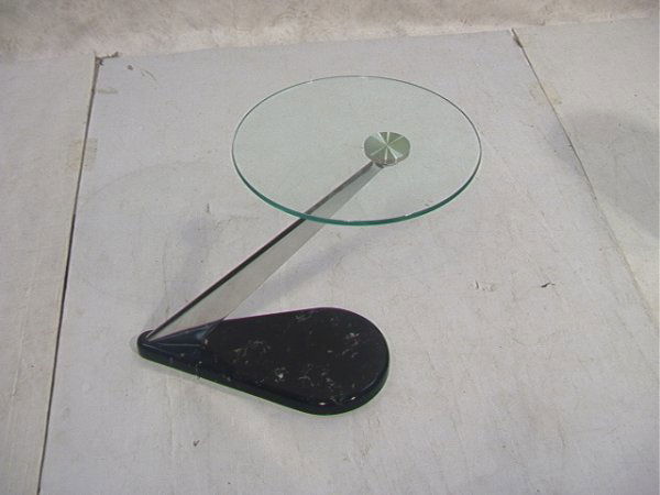 KAISER NEWMAN Cantilever glass table with marble b: KAISER NEWMAN Cantilever glass table with marble base. Dimensions: H: 20.25 inches: W: 16 inches: D: 19 inches Condition: Excellent condition. US Shipping charge: Pick up or shipping quote from outsid