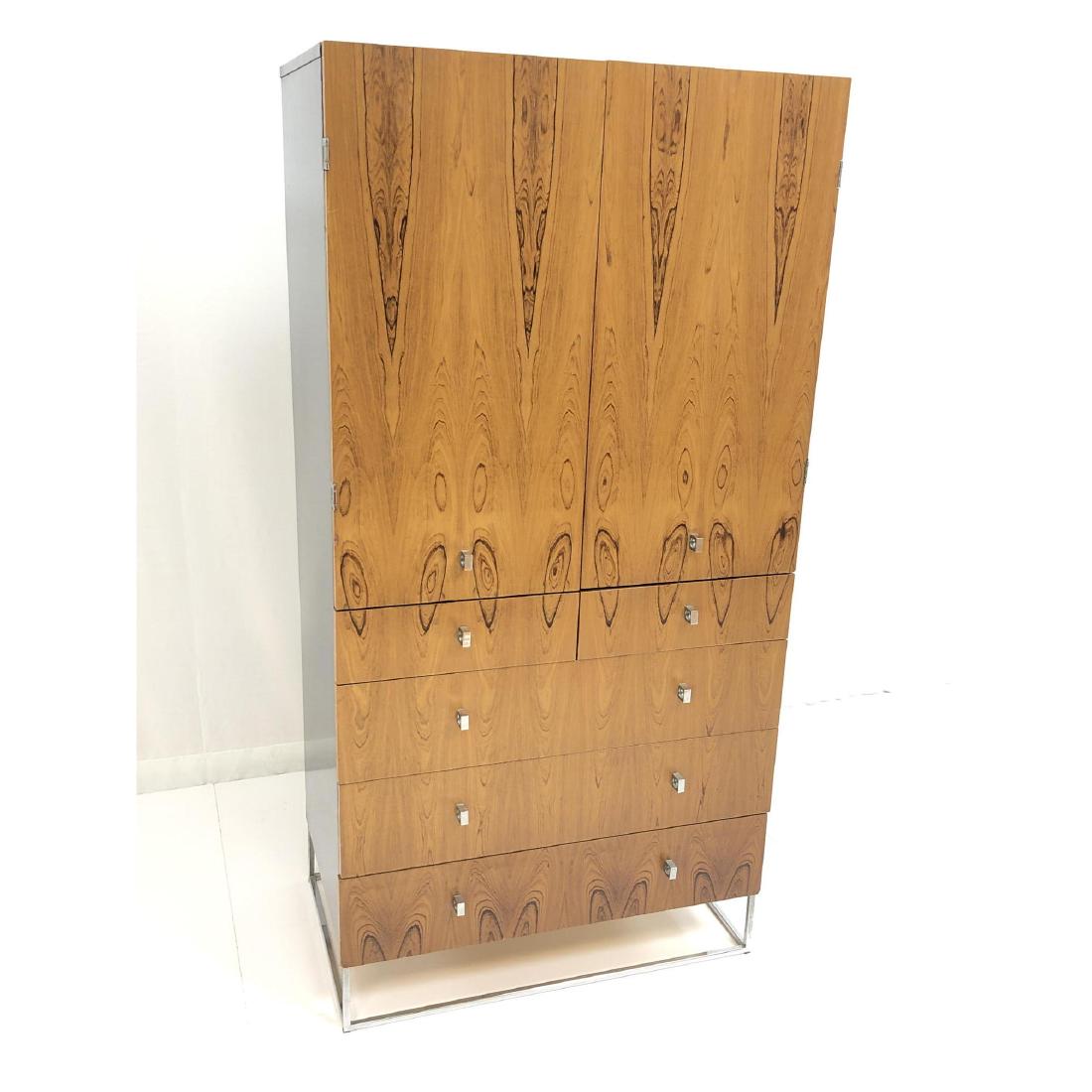 ROUGIER Rosewood Chiffarobe Chest. Ebonized top a: ROUGIER Rosewood Chiffarobe Chest. Ebonized top and sides. Modern chrome pulls & square tube base frame. Interior shelves. ROUGIER mark to 2nd drawer.-- Dimensions: H: 64 inches: W: 32 inches: D: 21 i