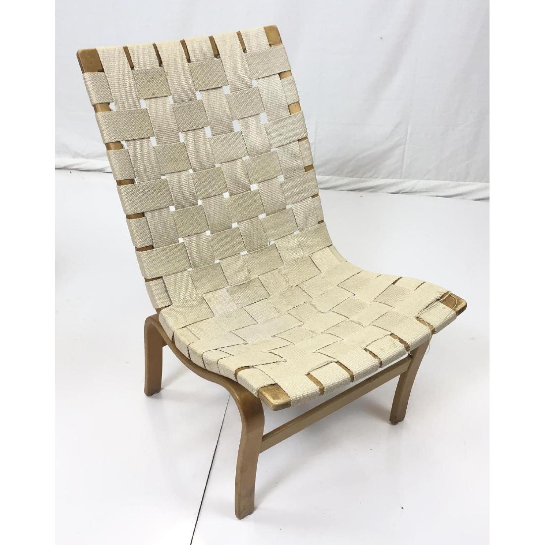 BRUNO MATHSSON Laminated Wood Lounge Chair. Woven: BRUNO MATHSSON Laminated Wood Lounge Chair. Woven beige fabric webbing. Early Paper label. -- Dimensions: H: 32 inches: W: 19.5 inches: D: 24 inches ---