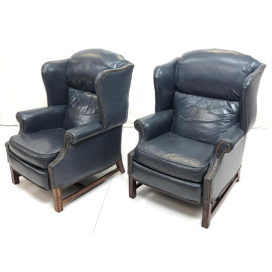 Pr BARCALOUNGER Blue Leather Wing Chair Recliners: Pr BARCALOUNGER Blue Leather Wing Chair Recliners. Traditional wood legs, metal stud trim. Marked.-- Dimensions: H: 44 inches: W: 31.5 inches: D: 36 inches ---
