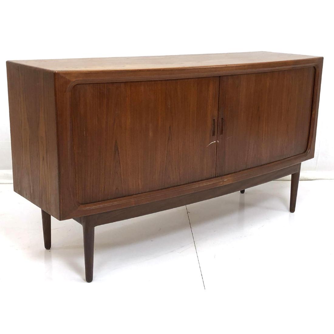 Danish Modern Teak Credenza Sideboard. Sliding Ta: Danish Modern Teak Credenza Sideboard. Sliding Tambour Doors. Raised on tapered peg legs. Bowed front profile. -- Dimensions: H: 35 inches: W: 62.5 inches: D: 19.5 inches ---